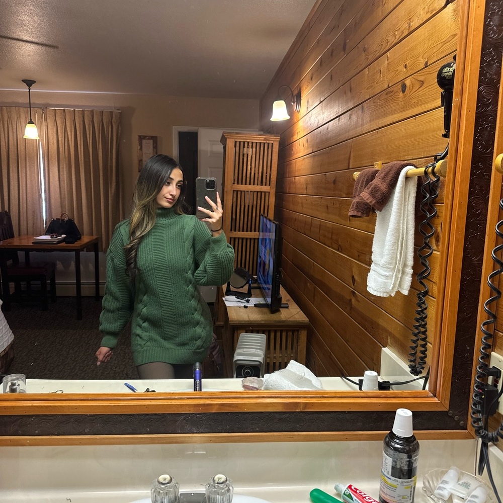 A green winter dress turtleneck